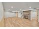 Spacious basement with vinyl flooring and a fireplace at 6334 S Elati St, Littleton, CO 80120