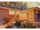 Charming brick home exterior with landscaped front yard and bright entryway at 6334 S Elati St, Littleton, CO 80120