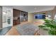 Bright living room featuring a marble fireplace and hardwood floors at 6334 S Elati St, Littleton, CO 80120