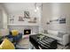 Inviting living room featuring a fireplace, comfortable seating, and stylish decor at 7745 S Trenton Ct, Centennial, CO 80112
