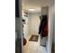 Functional entryway with tile flooring, coat hooks, and a window at 1901 Clear Creek Dr # A-104, Georgetown, CO 80444