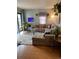 Well-lit living room boasting a comfy sectional couch and natural light at 1901 Clear Creek Dr # A-104, Georgetown, CO 80444