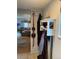 Cozy mudroom features a white shelf and hooks for coats and skis at 1901 Clear Creek Dr # A-104, Georgetown, CO 80444