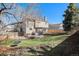 Spacious backyard featuring a patio, barbecue grill, and lush green grass, perfect for outdoor living at 5821 S Quatar Cir, Centennial, CO 80015