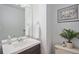 Clean and simple bathroom with a modern sink and a neutral color palette at 5821 S Quatar Cir, Centennial, CO 80015