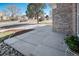 Inviting front yard view showcasing a well-maintained walkway and landscaping at 5821 S Quatar Cir, Centennial, CO 80015