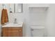 Cozy bathroom features a modern sink and vanity, with neutral walls and fixtures at 1440 S Logan St, Denver, CO 80210