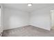 Simple bedroom with carpeted floors and neutral walls at 1440 S Logan St, Denver, CO 80210