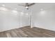 Roomy bedroom with double closets and wood-look floors at 1440 S Logan St, Denver, CO 80210
