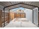 Covered carport with gated access to backyard at 1440 S Logan St, Denver, CO 80210