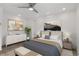 Main bedroom with stylish furnishings and ceiling fan at 1440 S Logan St, Denver, CO 80210