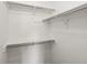Walk in closet with built-in shelving offering efficient storage and organization at 4858 S Quintero Cir, Aurora, CO 80015