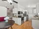 Bright kitchen boasts stainless steel appliances and granite countertops at 4858 S Quintero Cir, Aurora, CO 80015