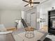 Open-concept living space with stairway and access to the kitchen with great flow for entertaining at 4858 S Quintero Cir, Aurora, CO 80015