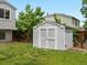 Backyard shed for extra storage with great lawn and landscaping potential at 4858 S Quintero Cir, Aurora, CO 80015