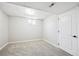 Basement bedroom with carpet and window at 3931 S Uinta St, Denver, CO 80237