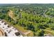 Aerial view of lush green surroundings near the building at 6000 W Floyd Ave # 214, Denver, CO 80227