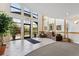 Bright lobby with comfortable seating, large windows, and modern decor at 6000 W Floyd Ave # 214, Denver, CO 80227