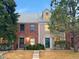 Charming townhomes featuring brick and siding exteriors with well-maintained landscaping and inviting entrances at 5708 E 10Th Ave, Denver, CO 80220