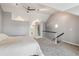 Bright bedroom featuring high ceilings, neutral tones, ceiling fan and a staircase at 5708 E 10Th Ave, Denver, CO 80220