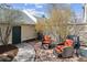 Comfortable patio setup with chairs and grill, offering a private outdoor space at 5708 E 10Th Ave, Denver, CO 80220