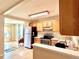Well-lit kitchen features tile floors and stainless steel appliances at 1965 Havana St, Aurora, CO 80010
