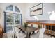 Bright dining room with sliding glass doors leading to a deck at 1147 S Flower Cir, Lakewood, CO 80232