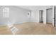 Spacious bedroom with hardwood floors and natural light from multiple windows at 6633 Bridlespur St, Castle Pines, CO 80108