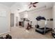 Open basement area featuring exercise equipment, and stainless steel appliances at 2257 Deerpath Rd, Franktown, CO 80116