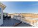 Relaxing on this spacious deck offers stunning views of the surrounding landscape at 2257 Deerpath Rd, Franktown, CO 80116