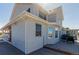 Exterior features a spacious deck, large windows for ample light, and modern siding at 2257 Deerpath Rd, Franktown, CO 80116