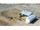This aerial image shows outbuildings and horse runs at 2257 Deerpath Rd, Franktown, CO 80116