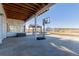 Spacious backyard patio with basketball hoop, gazebo, and plenty of space to entertain at 2257 Deerpath Rd, Franktown, CO 80116