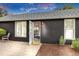 Inviting home exterior with an open front door revealing a glimpse of the bright interior at 211 E Emma St, Lafayette, CO 80026