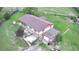 Aerial view of home featuring a spacious backyard, deck, and mature trees at 5870 Nelson Ct, Arvada, CO 80004