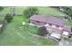 Aerial view of home featuring a spacious backyard, deck, and mature trees at 5870 Nelson Ct, Arvada, CO 80004