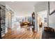 Bright and spacious living room with hardwood floors and stylish accents at 111 S Monroe St # B203, Denver, CO 80209
