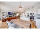 Open floor plan combining a living room, kitchen, and dining area at 111 S Monroe St # B203, Denver, CO 80209