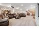 Expansive basement featuring a seating area, bar, and staircase, ideal for entertainment and relaxation at 7186 Weaver Cir, Castle Rock, CO 80104