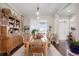 Cozy dining room with natural wood furnishings, bathed in soft, inviting light at 7186 Weaver Cir, Castle Rock, CO 80104