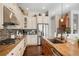 Modern kitchen with stainless steel appliances, granite countertops, and sleek cabinetry at 7186 Weaver Cir, Castle Rock, CO 80104