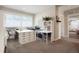 Bright office space with large window and lots of custom built in storage at 7186 Weaver Cir, Castle Rock, CO 80104