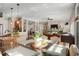 Spacious open concept living area with a dining table, kitchen island, and comfortable seating area at 7186 Weaver Cir, Castle Rock, CO 80104