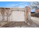 Detached garage with alley access and brick exterior at 2219 W 33Rd Ave, Denver, CO 80211