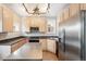 Modern kitchen with stainless steel appliances and an island at 2219 W 33Rd Ave, Denver, CO 80211