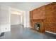 Bright living room featuring a fireplace and hardwood floors at 2219 W 33Rd Ave, Denver, CO 80211