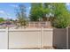 View of garages with painted siding, offering additional parking and storage at 1160 S Clinton St # 40, Denver, CO 80247