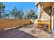 Spacious outdoor wooden deck area with a railing, and room for planters and decor at 8822 Fiesta Ter, Lone Tree, CO 80124