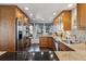 Well-equipped kitchen featuring granite countertops, stainless steel appliances, and ample cabinet space at 8822 Fiesta Ter, Lone Tree, CO 80124