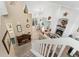 Spacious living area with high ceilings, fireplace, and open layout, perfect for entertaining and relaxation at 6819 S Webster St # E, Littleton, CO 80128
